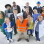 A group of people dressed in their different career outfits